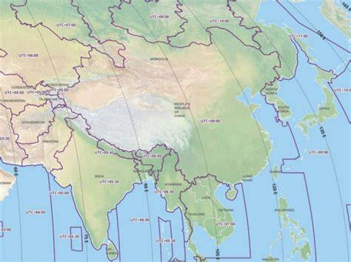 When did China change to one time zone?
