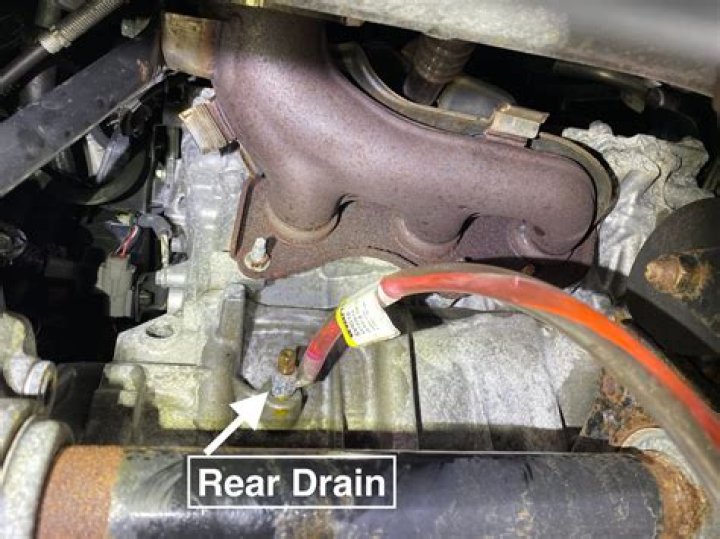 Where is the coolant drain plug on engine block?
