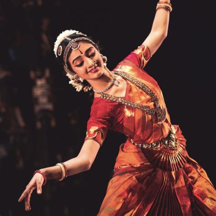 Who performs the Bharatanatyam dance?